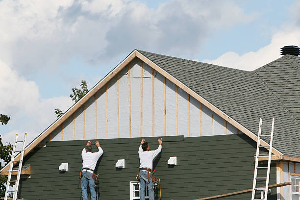 Professional Storm Damage Siding Repair technician working in Markham, IL